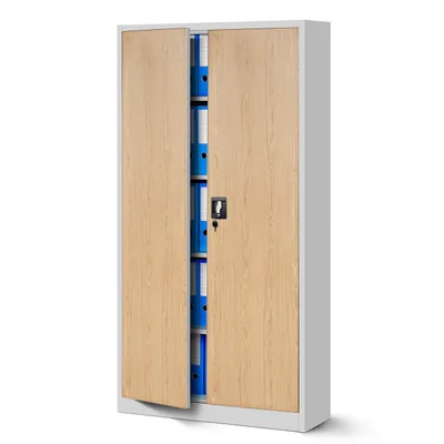 A closed metal filing cabinet with wood-grain doors, showing several blue binders inside one half of the cabinet.