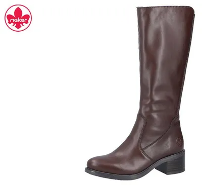 Auf dem Bild ist ein weißer Schuh zu sehen der von der Seite abgebildet ist Der Schuh hat eine flache Sohle und ein schlichtes Design ohne auffällige Verzierungen