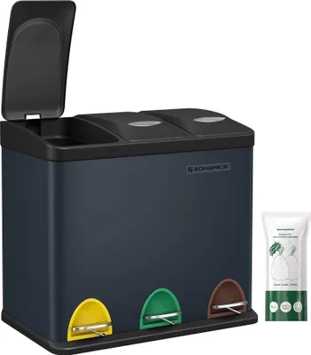 A dark gray multi-compartment trash can with colored pedals and a package of trash bags.