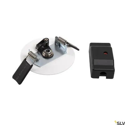 A white circular mounting plate with two spring-loaded clips and a black connector piece are shown on a white background. A separate black rectangular connector is to the right.