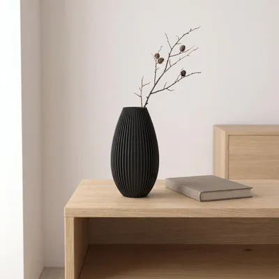 Produktbild von Deko Vase gerippt 17 cm, schlanke Tropfenform aus PLA – Schwarz