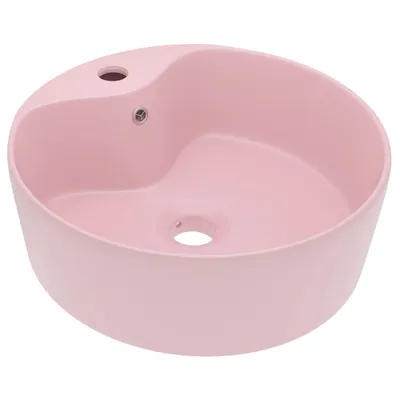 A pink ceramic sink is shown against a white background.