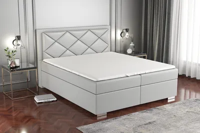 Produktbild von Boxspringbett BUXI 120x200 mit 2 Bettkästen, Bonell-Matratze und Topper. Dekorative Stifte an den Seiten der Kopfstütze. Bett Komplett-Set mit Matratze,Bettkasten & Kopfteil. Stoff Eko Cayenne. Elegantes Bett mit massives Kopfteil.