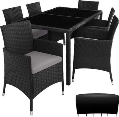 A black rattan dining set with a glass tabletop and gray cushions, including a table and six chairs, is displayed on a white background. A black protective cover for the set is also shown.