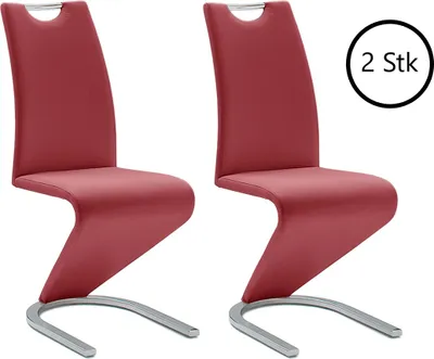 Two red dining chairs with silver cantilever bases are shown against a white background.