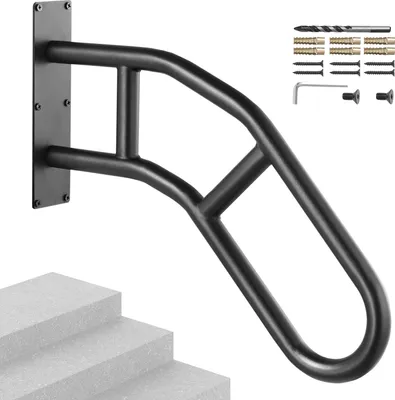 A black metal handrail mounted on a wall above a set of concrete stairs, with various mounting hardware and tools shown in the upper right corner.