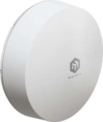 A white, round electronic device with the MikroTik logo on it, shown from a diagonal angle against a white background.