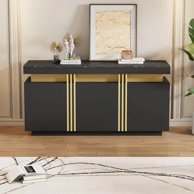A dark gray sideboard with gold accents is displayed in a room with a neutral wall and a patterned rug on the floor.