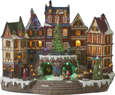 Produktbild von Luville Weihnachtsdorf Miniatur Dorfplatz - Weihnachten Dekoration mit drehendem Baum - Weihnachtsdeko mit warmweißer Beleuchtung - Weihnachtsschmuck inkl. Adapter - L42 x B25 x H32 cm