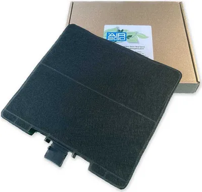 A black air filter is shown in front of a cardboard box.