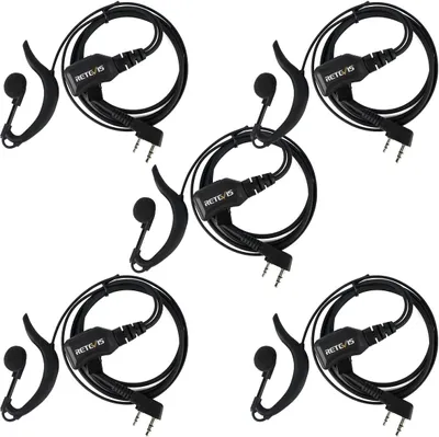 Multiple black earpiece headsets are arranged on a white background.