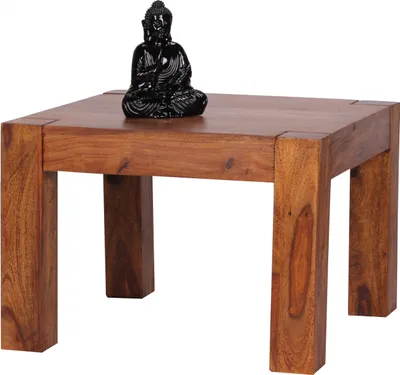 A dark brown wooden side table with a black Buddha statue on top, set against a white background.