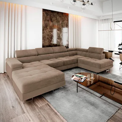A modern living room featuring a large U-shaped sectional sofa.