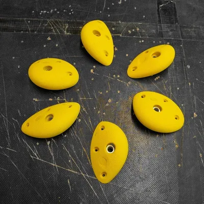 Produktbild von Steilstein 61-63 Antireaktionäre Positivisten - Klettergriff-Set (6 Stück, Serie FREIE RADIKALE), Farbe:Wunschfarbe (Anfertigung)