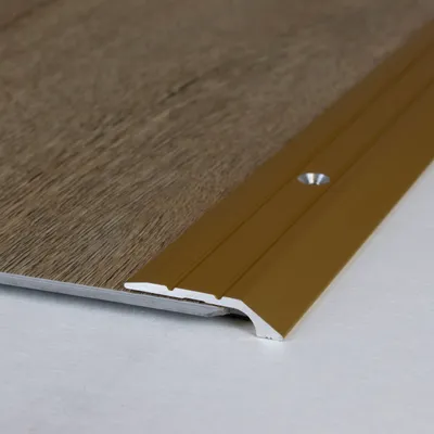 Produktbild von PROVISTON | Abschlussprofil | Aluminium eloxiert | Goldfarbig | Breite 30 mm | Höhe 4.5 mm | Länge 2700 mm | Selbstklebend | Einfassprofil | Einschubprofil | Abschlussleiste | Bodenprofil | 1 Stück
