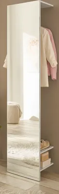 A tall, narrow wardrobe with a full-length mirror and shelves, showing clothing and shoes.