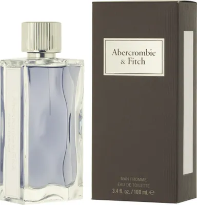 A bottle of Abercrombie & Fitch First Instinct Eau de Toilette for men and its packaging are displayed against a white background.