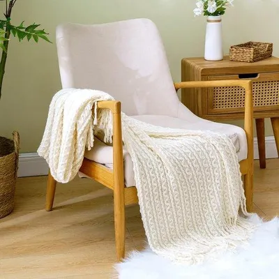 Produktbild von Unyqoos® Kuscheldecke – gestrickte Boho-Wohndecke, 100%.Polyacryl, weich & flauschig, uni, 125 x 150 cm, Weiß, für Sofa, Sessel, Bett & Büro