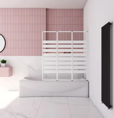 A modern bathroom with a bathtub and a shower screen.