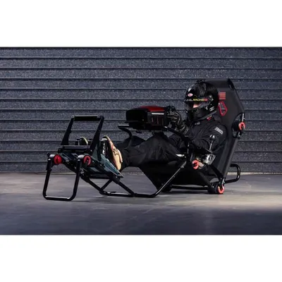 Produktbild von Next Level Racing F-GT Lite Faltbares Renn-Simulator-Cockpit für Formel- & GT-Positionen aus pulverbeschichtetem Stahl in Schwarz/Rot, kompatibel mit gängigen Lenkrädern & Pedalen (Logitech, Thrustmaster, Fanatec). Max. Traglast 130kg, Nutzerhöhe 120-200cm, Gewicht 19kg. Maße gefaltet: 75x40x87cm