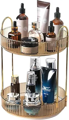 Imagen del producto de Organizador de maquillaje Unyqoos® de 360° giratorio, con dos niveles de almacenamiento para cosméticos, fabricado en ABS reforzado con estructura metálica dorada, color ámbar