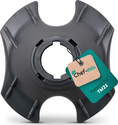A gray kitchen appliance part with a tag attached.