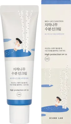 A tube of Round Lab Birch Juice Moisturizing Sun Cream and its packaging are shown against a white background.