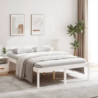 A white wooden bed frame with white bedding in a bedroom setting.