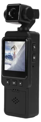 A black action camera with a screen displaying a skier on a snowy mountain.