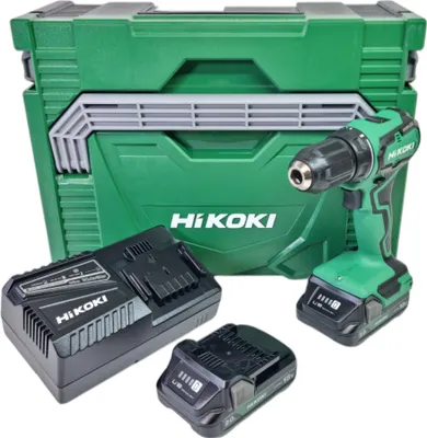 A cordless drill set with a case, charger, and batteries.