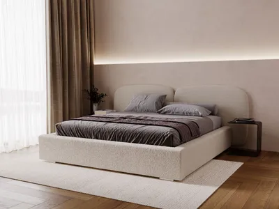 A modern bedroom with a large bed.
