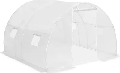 A white, arched greenhouse structure with an open front.