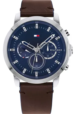 A close-up studio shot of a Tommy Hilfiger watch.