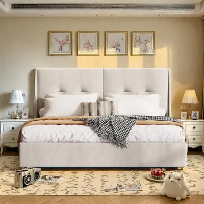 A bedroom scene with a bed, nightstands, and artwork on the wall.