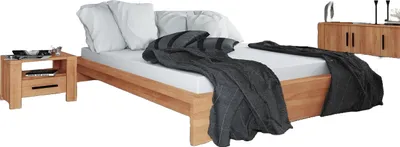 Produktbild von Bett Lubic 3 aus Kernbuche massiv 120x200 ohne Kopfteil mit Holzfußgestell