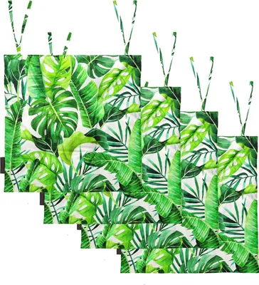 A set of four green and white patterned seat cushions with ties, arranged in a staggered formation.