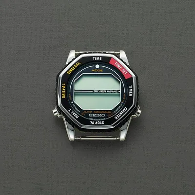Obrázek produktu pro Pánské digitální hodinky z nerezové oceli v retro designu s otočným rámečkem - Seiko Model: SMGG17P1 Yellow