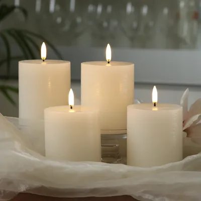 Produktbild von LED Kerzenset PIA - Rustik-Optik - H: 10cm - inkl. Batterien und Fernbedienung - creme - 4er Set
