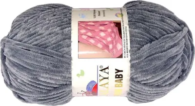 A ball of grey yarn with a product label.