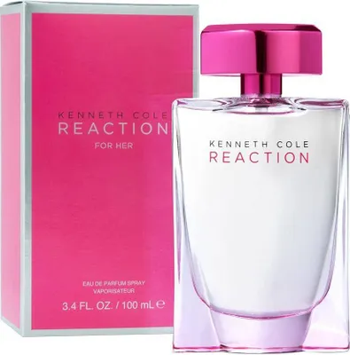 A bottle of Kenneth Cole Reaction perfume and its packaging are displayed against a white background.