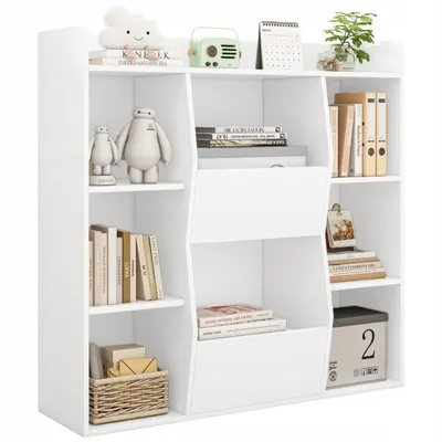 A white bookshelf with various items on its shelves.
