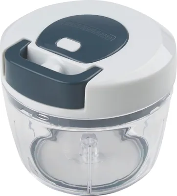 A close-up studio shot of a manual food chopper.