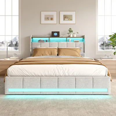A modern bedroom with a bed featuring LED lighting.