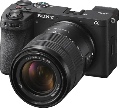A black Sony Alpha 6700 digital camera with a lens attached, shown from a diagonal angle against a white background.