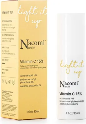 A product box and bottle of Vitamin C serum.