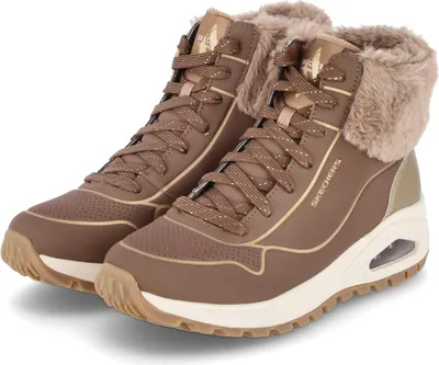 A pair of brown Skechers boots with fur trim.