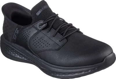 A black Skechers slip-on shoe is shown from a side angle against a white background.