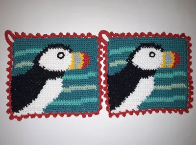 Produktbild von 1 Paar Topflappen Papageientaucher Handarbeit gehäkelt Baumwolle Tier Vogel