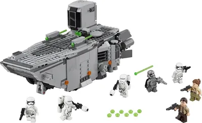 A Lego Star Wars First Order Transporter set with several minifigures and accessories, displayed on a white background.