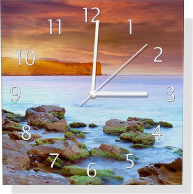 Produktbild von Wallario Design Wanduhr Sonnenaufgang am Meer mit Landzunge und Felsen im Wasser aus Aluverbund, Größe 30 x 30 cm